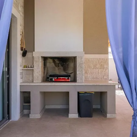 Holiday home Lovely In With Kitchen